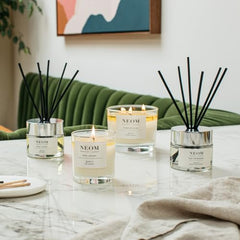 NEOM Happiness uses Neroli, Mimosa and Lemon essential oils for mood-boosting aroma.