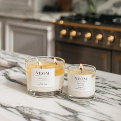 NEOM Happiness 1 Wick Candle pool of wax for even burn and steady fragrance.