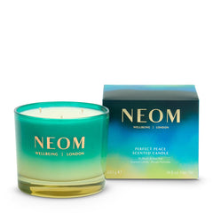 NEOM Perfect Peace candle wax close-up shows natural ingredients for serene ambiance