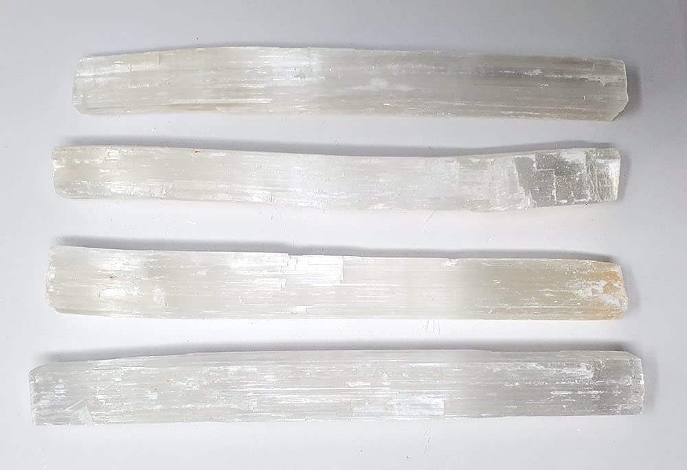 New Age Imports selenite sticks 7-8 inch for cleansing energy and home protection.