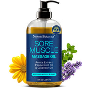 Nexon Botanics sore muscle massage oil bottle on table ready for sessions