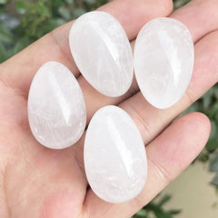 Neyisaa polished stone egg in hand: tactile focus for mindfulness and rituals