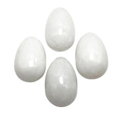 Neyisaa mini stone egg pack of four, polished for display.