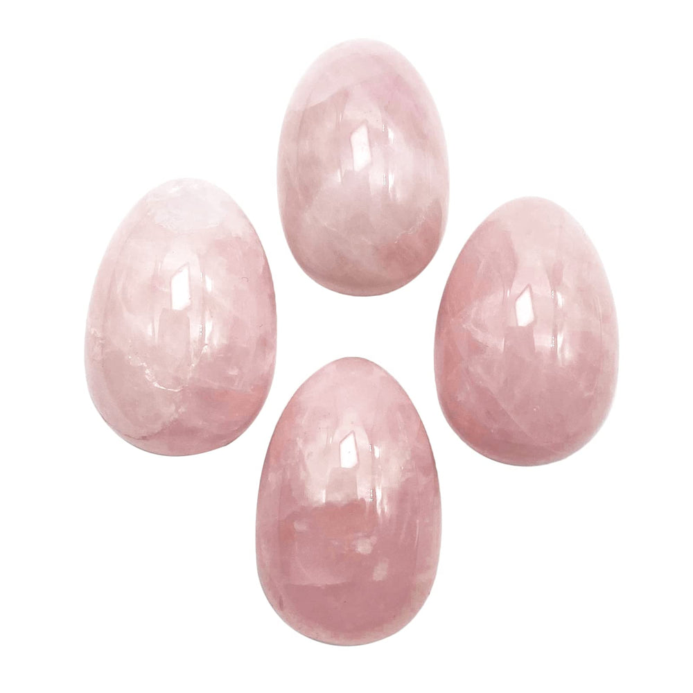 Neyisaa rose quartz mini egg handheld for meditative focus and calm.