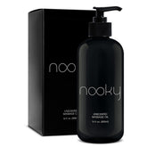 NOOKY Unscented Massage Oil bottle pour showing a clean, non-greasy glide.