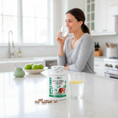 Nopalina NOPA Leaf capsules with glass of water illustrate easy daily digestion support.