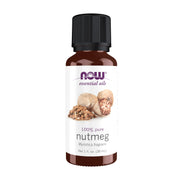 NOW Foods Nutmeg Oil bottle in diffuser setup for energizing aroma.