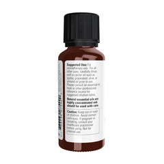 NOW Foods Frankincense Oil cap close-up shows child-resistant safety feature.
