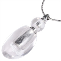 Detailed view of the rock quartz pendant on the Nupuyai diffuser necklace.