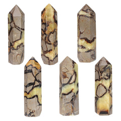 Nupuyai Septarium chakra-focused wand aiding energy balance during yoga.