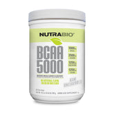 NutraBio BCAA 5000 unflavored powder bottle close-up for recovery.