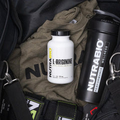 NutraBio L-Arginine capsules close-up highlighting high-purity supplement