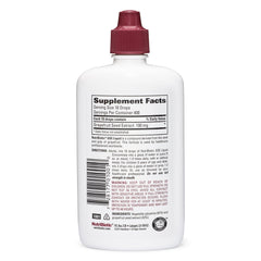 NutriBiotic GSE liquid being poured for easy dosing