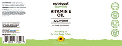 Nutricost Vitamin E Oil application showing precise dropper for controlled use.