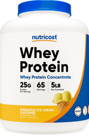 Nutricost Pineapple Whey Protein bottle close-up highlights tropical flavor for workouts.
