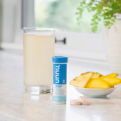 Glass of water with Nuun Active Tropical Fruit tab for refreshed hydration.