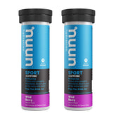 Nuun Energy Wild Berry tablet dissolving in water for quick hydration.