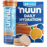Nuun Immunity tablet dissolving in water for refreshing hydration