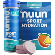 Nuun Sport Tropical tablet dissolving in water for refreshing hydration.