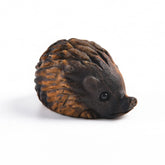 NUZUJX rainbow fluorite crystal hedgehog figurine enhances calm ambiance on a shelf