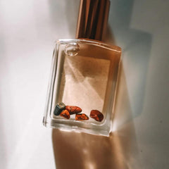 Olivine Atelier Tiger Moon travel-cap bottle ready for on the go use.