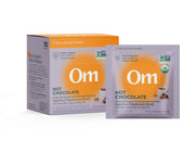 Empaque de OM Mushroom Superfood Hot Chocolate Blend para un ritual reconfortante diario.