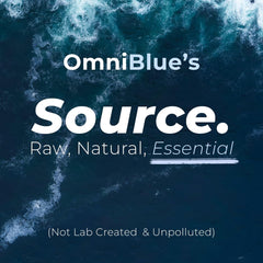 Droplets poured from OmniBlue into a glass, easy to mix into beverages for hydration.