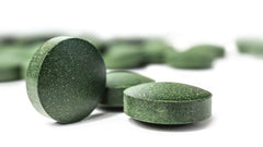 On Target Living family taking tablets for everyday wellness.
