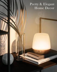 Onaboviva diffuser with bamboo base adds natural decor and stability.