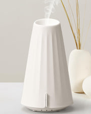 Onaboviva diffuser top view, compact design ideal for desks.