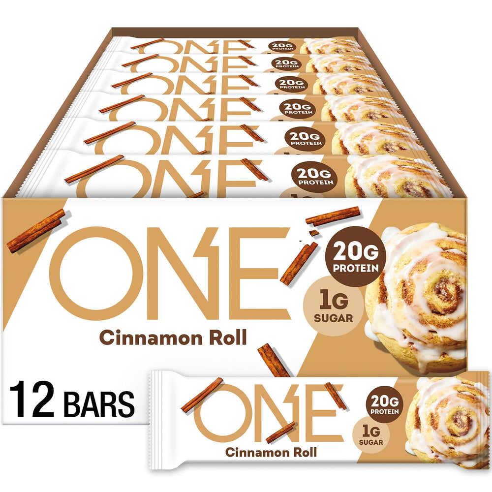 ONE Cinnamon Roll Bar packaging highlights gluten-free protein for on-the-go snacking.