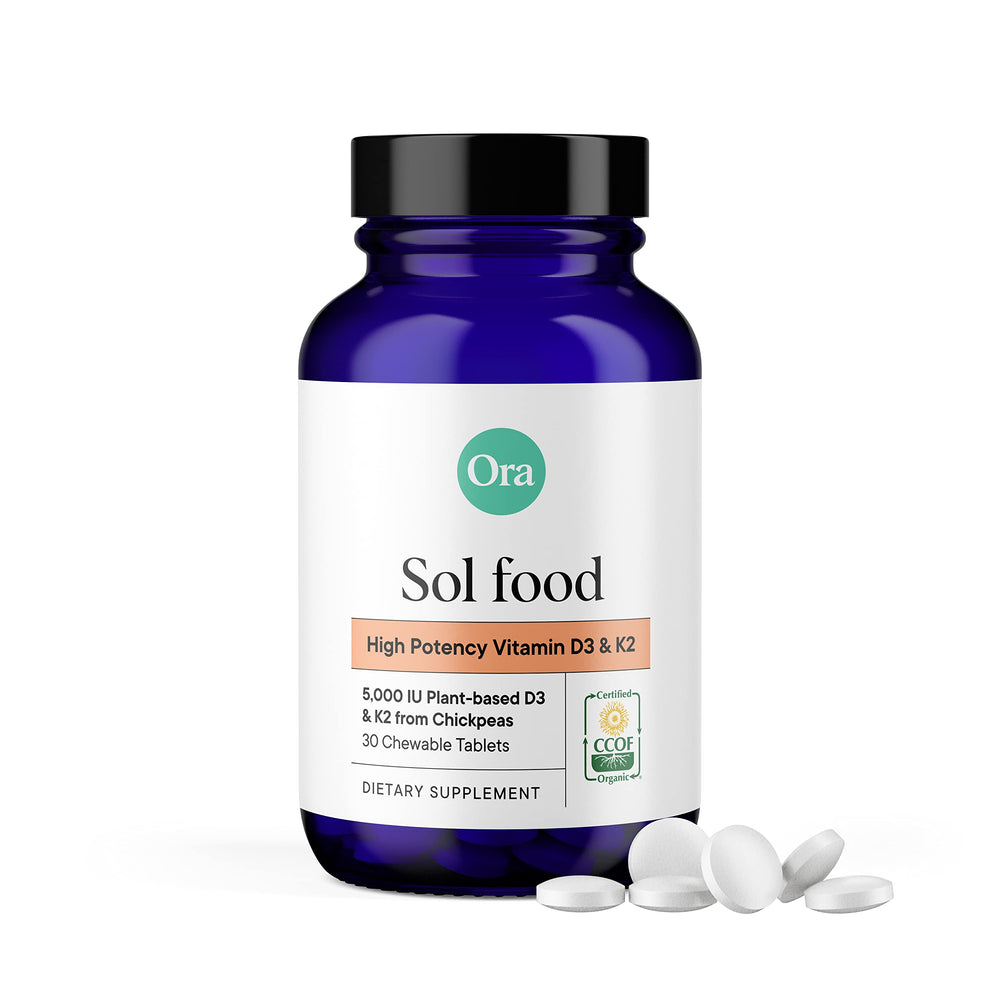 Close-up of Ora Organic Vitamin D3 5000IU + K2 chewable tablet for daily bone support.