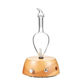 Organic Aromas Elegance diffuser setup with glass nebulizer and lightwood base