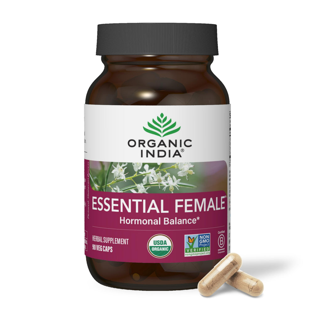 Organic India Essential Female bottle with capsules for hormonal balance support.