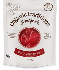 Organic Traditions Daily Cranberry+ powder bottle ready for daily use.