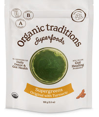 Organic Traditions Super Greens powder being poured into a glass