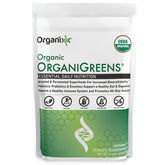 Organixx Greens canister close-up highlights organic nutrients for daily energy support.