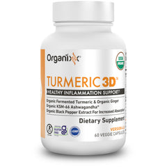 Organixx turmeric curcumin capsules prepared for daily immune and joint support.
