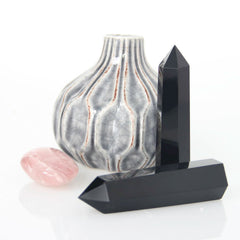 Orientrea Obsidian Wand tip close-up highlighting facets for rituals.