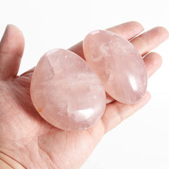 Orientrea Hand-polished rose quartz palm stone with smooth, comforting grip.