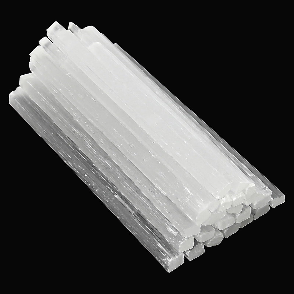 Orientrea selenite wand close-up, 6-6.5 inches, supports chakra balance and calm energy.