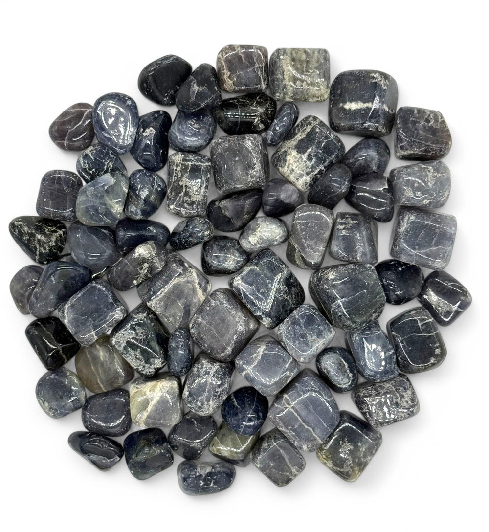 Pachamama Essentials Iolite tumbled stone for visualization focus and future insights.