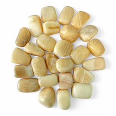 Pachamama Essentials Orange Calcite on hand promoting focus and new beginnings.
