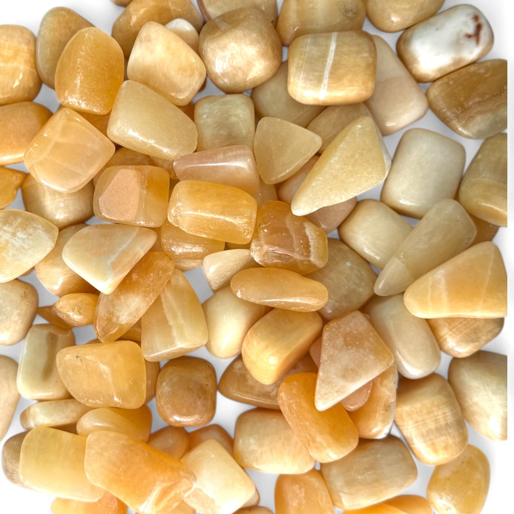 Pachamama Essentials Orange Calcite tumbled stone energizing creativity and confidence.