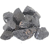 Pachamama Essentials rough black tourmaline crystal closeup for grounding and protective energy.