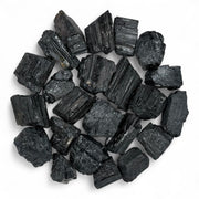 Pachamama Essentials rough black tourmaline stones for grounding and focused work.