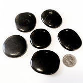 Pachamama Essentials Shungite worry stone closeup for calm focus and mindful energy