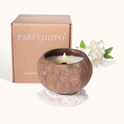 PARTYHIPPO coconut shell candle shown in a natural shell for calming ambience