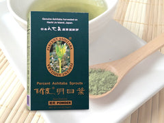 Percent Ashitaba Powder dispensing spoon illustrating convenient daily serving.