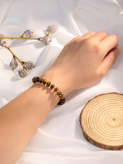 PESOENTH Adjustable Tiger Eye Bracelet fits most wrists with a secure rope design.